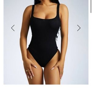 Naked Wardrobe Scooped Up Ribbed Bodysuit